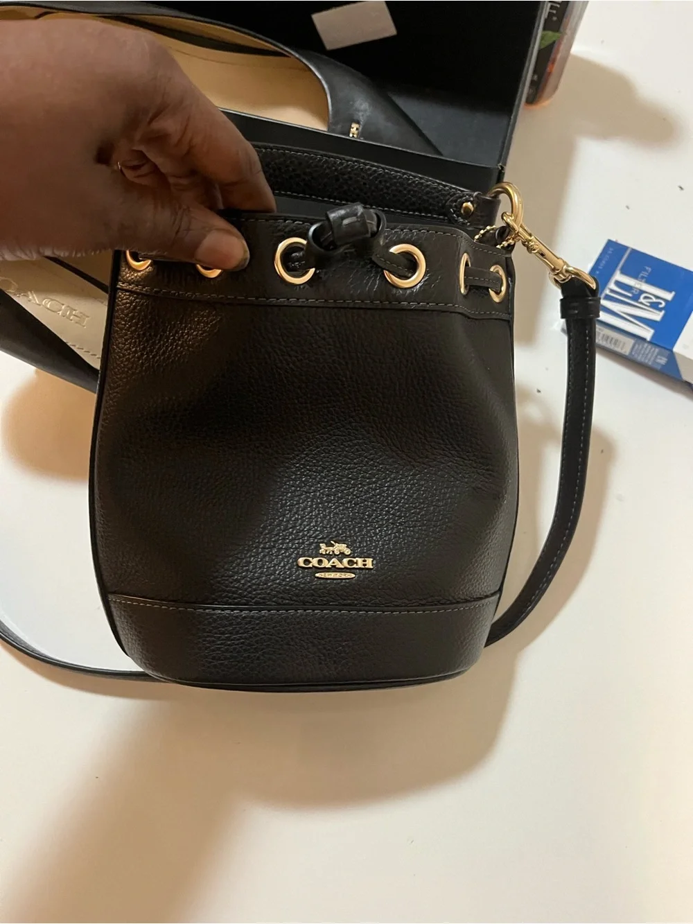 Coach Black Leather Pointed-Toe Pump with Gold Logo Accent. The purse is nwot